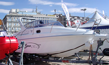 Picture of Reception desk with the "ULTIMATE 4-STROKE OUTBOARD" logo sign